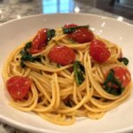 Pasta integrale con pomodorini e spinaci